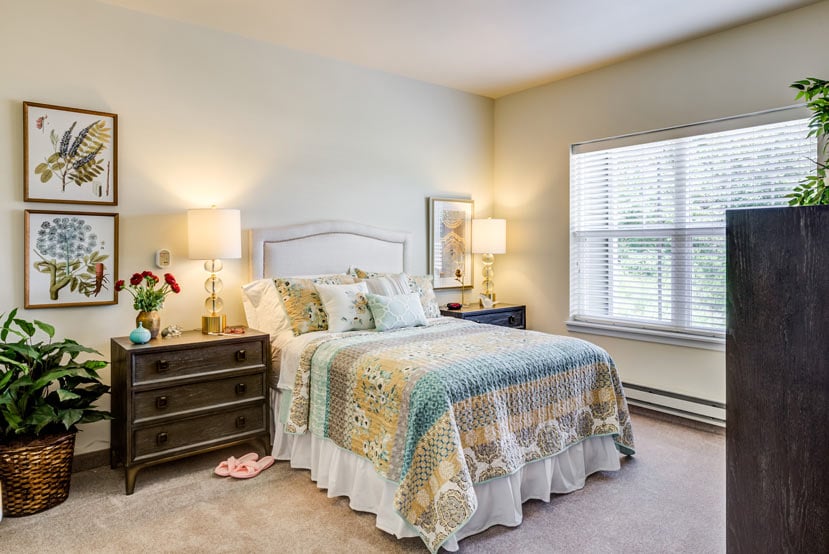 A furnished bedroom in a Cypress Springs apartment