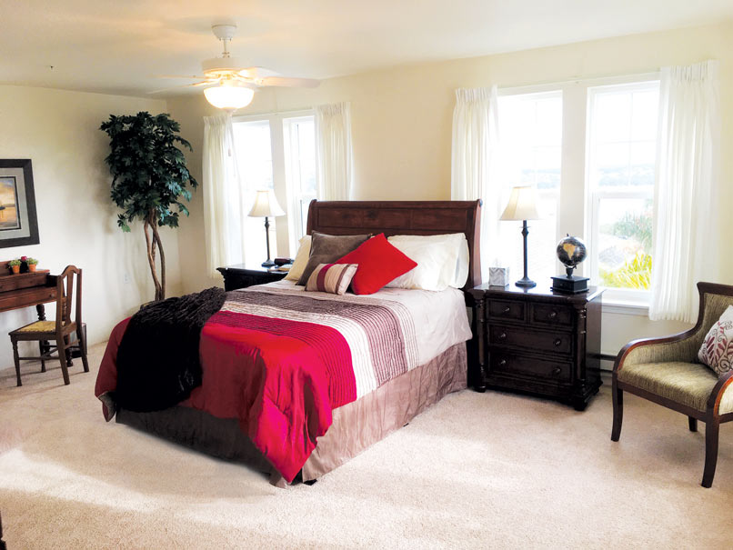 A furnished bedroom in a Cypress Springs apartment